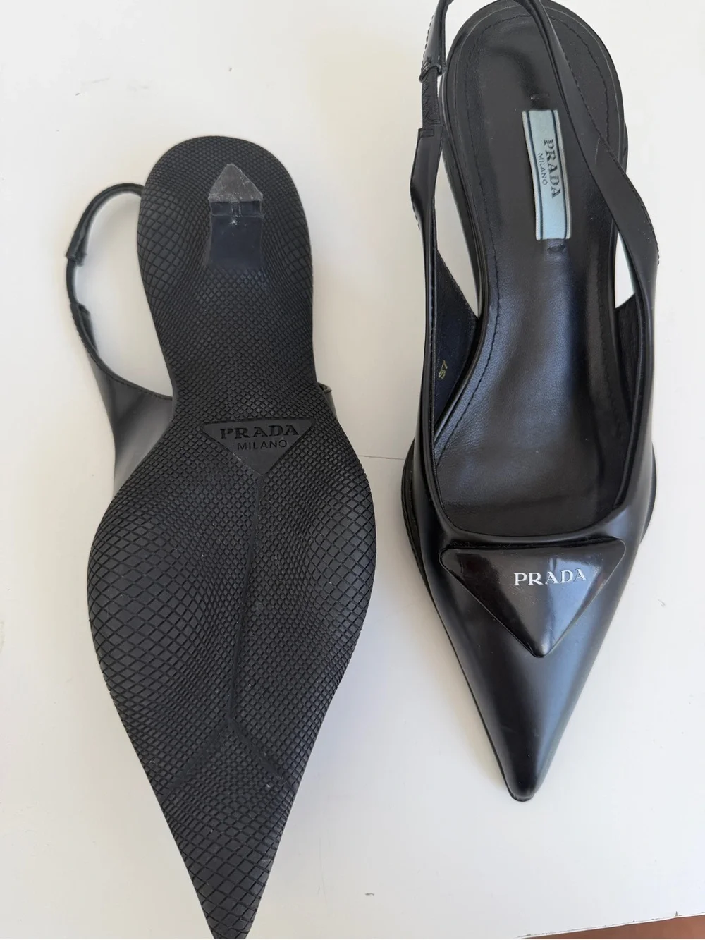 Prada Black Pointed Slingback Pumps with Logo Plaque